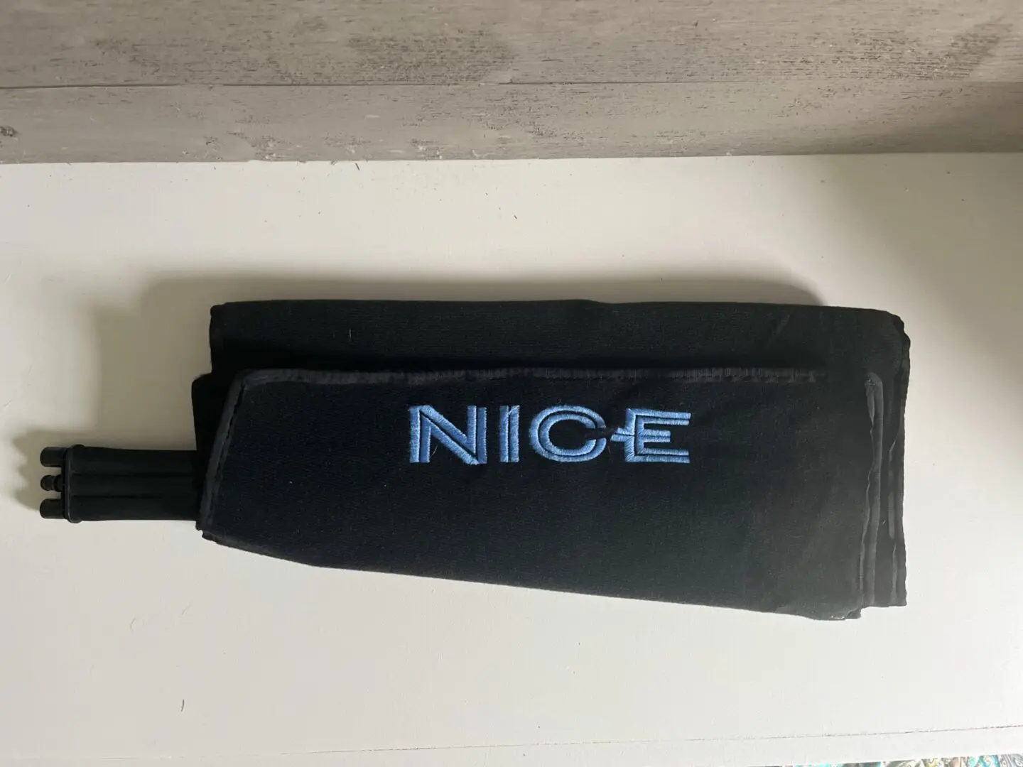 A picture of black colored NICE Cold compression wrap